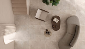 Fugleperspektiv av stue med flislagt gulv